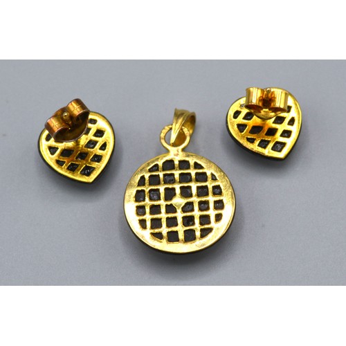 84 - An 18ct yellow gold and enamel diamond set pendant together with a matching pair of 14ct gold heart ... 