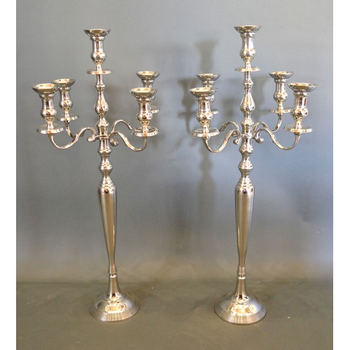 99 - A pair of five branch candelabrum with circular pedestal bases, 91.5cms tall