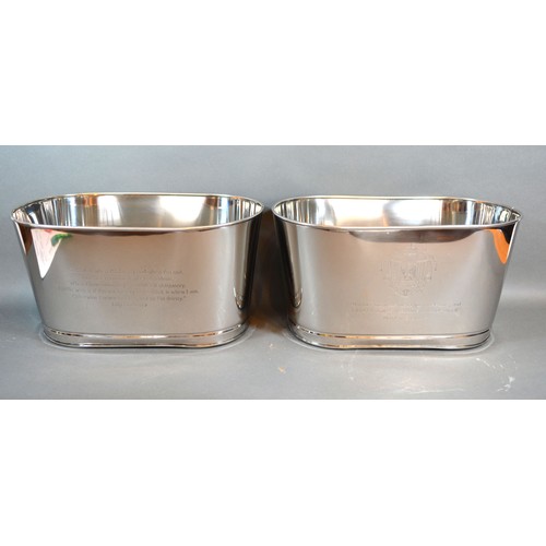 101 - A pair of Champagne coolers bearing script relating to Bollinger, 34.5cms long