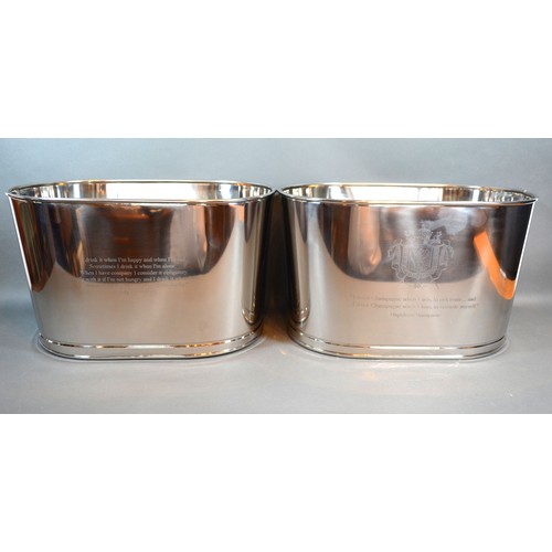 102 - A pair of large Champagne coolers bearing script relating to Bollinger, 43cms long