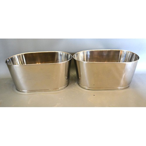 103 - A pair of large Champagne coolers bearing script relating to Bollinger, 65cms long