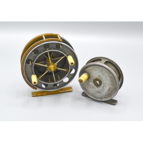 200 - An Army and Navy fishing reel, 9cms diameter, together with another similar by Army and Navy, 7cms d... 