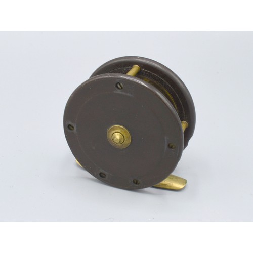 205 - Eaton and Deller a brass mounted fishing reel, 6.5cms diameter