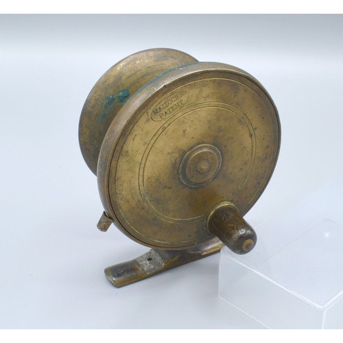 206 - A Mallochs Patent side casting fishing reel, 10cms diameter