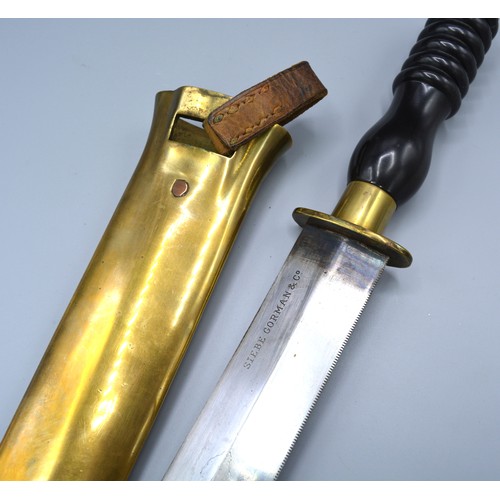 261 - A Divers knife by Siebe Gorman and Company with brass guard, moulded handle and brass scabbard, 45cm... 