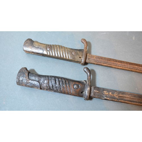 264 - Two WWI bayonets, 65cms long