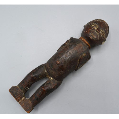 269 - An early African carved figure, 20cms long