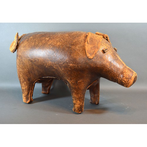 275 - Dimitri Omersa for Liberty of London, a leather footstool in the form of a pig, 64cms long,