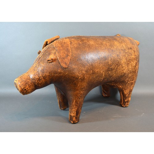 275 - Dimitri Omersa for Liberty of London, a leather footstool in the form of a pig, 64cms long,