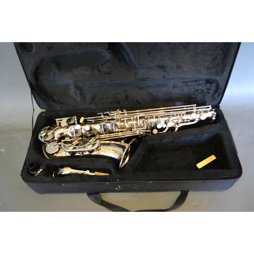 278 - A brass saxophone by Slade, WSS-896, with case