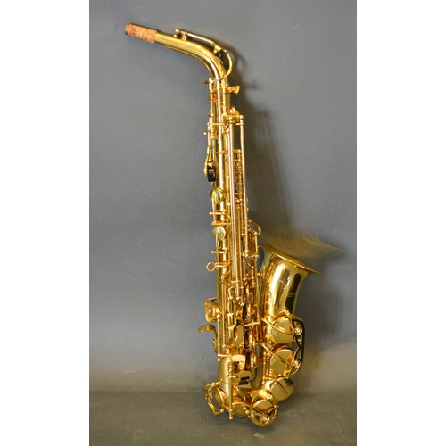 280 - A saxophone by Slade with case