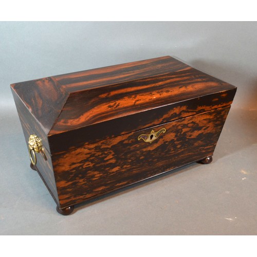 285 - A 19th century coromandel tea caddy, the hinged cover enclosing a blending bowl and two compartments