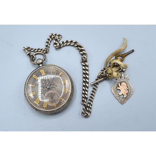 118 - A Chester silver cased pocket watch, the engraved dial with gold mounts and with silver cur link war... 