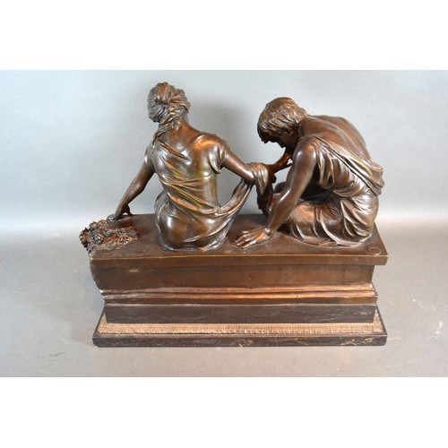 292 - A 20th century patinated bronze group in the form of two classical figures on a bench, bearing signa... 