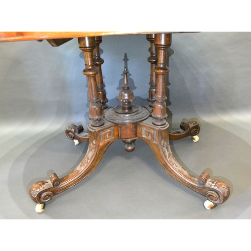 427 - A Victorian burr walnut and marquetry inlaid centre table, the moulded top above a quadruple turned ... 