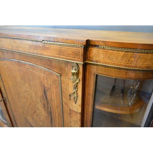 428 - A Victorian walnut marquetry inlaid and gilt metal mounted credenza cabinet with a central door flan... 