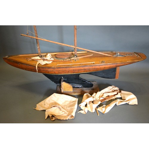 253 - A scratch built large model pond yacht, 122cms long