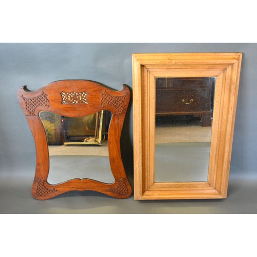 425 - An Indian carved hardwood folding table with pierced brass tray together with a Victorian carved oak... 