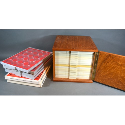 242 - A Coin Collectors Cabinet, table top, together with six coin collectors trays