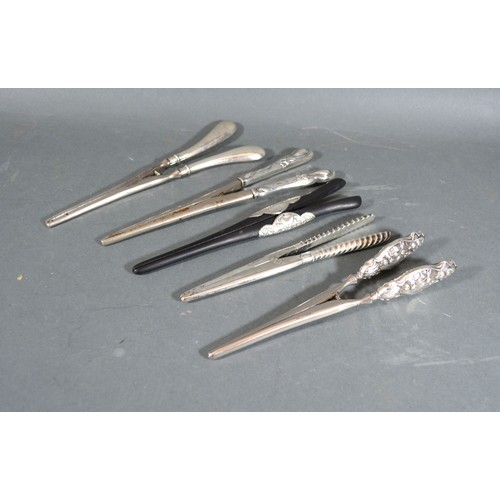 194 - A Pair of Edwardian Silver Glove Stretchers in the Secessionist Style together with four other pairs... 