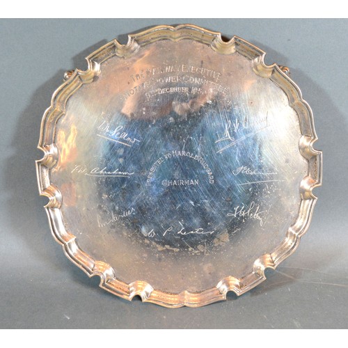 197 - A London Silver Presentation Salver of shaped outline with four scroll feet, 17 ozs. 25.5 cms diamet... 