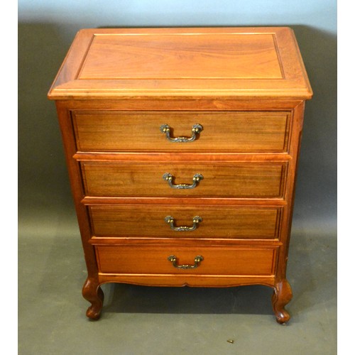220 - A Silver Plated Canteen of Cutlery housed within a Chinese hardwood four drawer chest with brass han... 