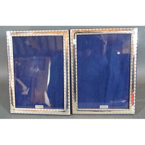 205 - A Pair of 925 Silver Rectangular Photograph Frames, 20 x 15 cms