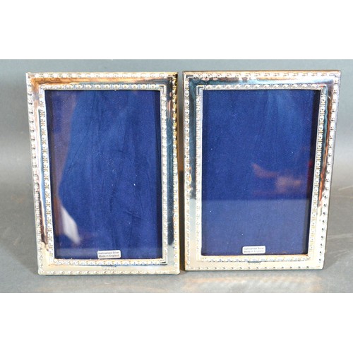 223 - A Pair of 925 Silver Rectangular Photograph Frames, 17.5 x 12.5 cms