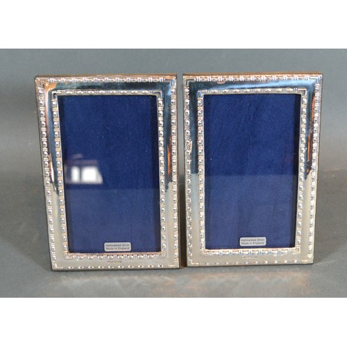 224 - A Pair of 925 Silver Rectangular Photograph Frames 15 x 10 cms
