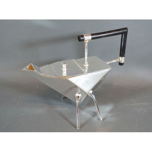 210 - A Silver Plated Teapot in the style of Christopher Dresser with ebonised handle, 23 cms long