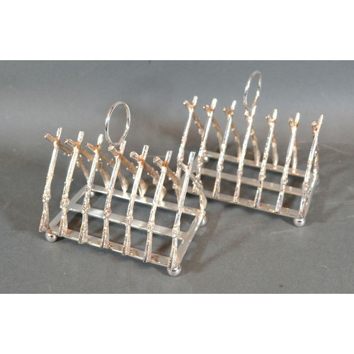 217 - A Pair of Silver Plated Six Division Toast Racks in the form of Rifles, 11.5 cms long