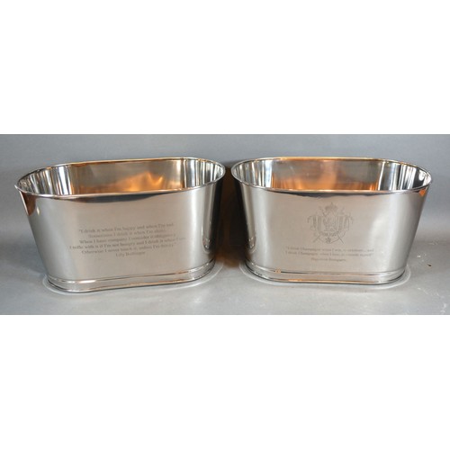 214 - A Pair of Champagne Coolers inscribed Bollinger 34.5 cms long