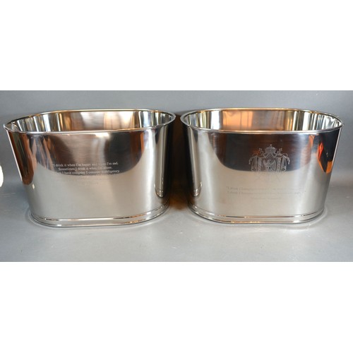 215 - A Pair of Champagne Coolers inscribed Bollinger, 43 cms long