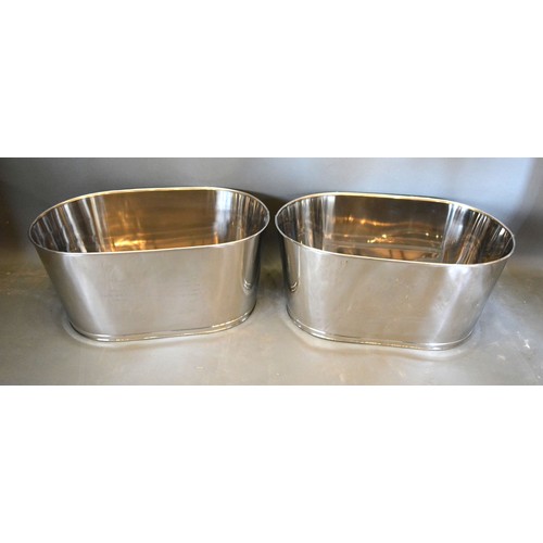 218 - A Pair of Large Champagne Coolers inscribed Bollinger 65 cms long