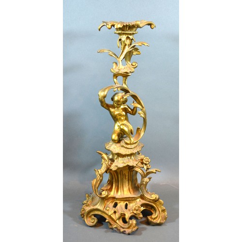 228 - A late 19th early 20th century French table centre of scroll form mounted with putti
50cm tall