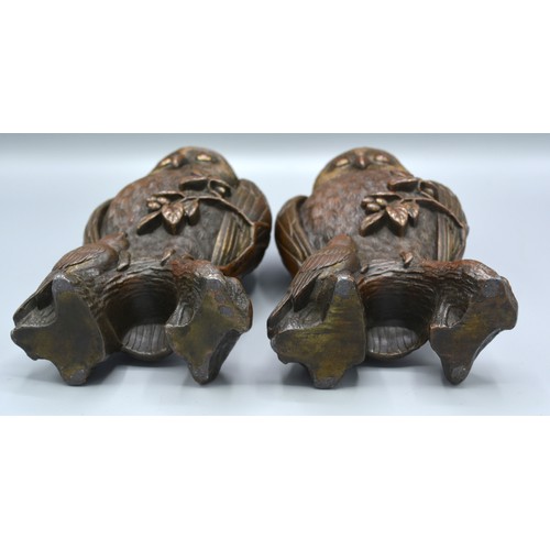 234 - A Pair of 19th Century Patinated Bronze Vases in the form of owls upon a branch with bird at foot, 1... 