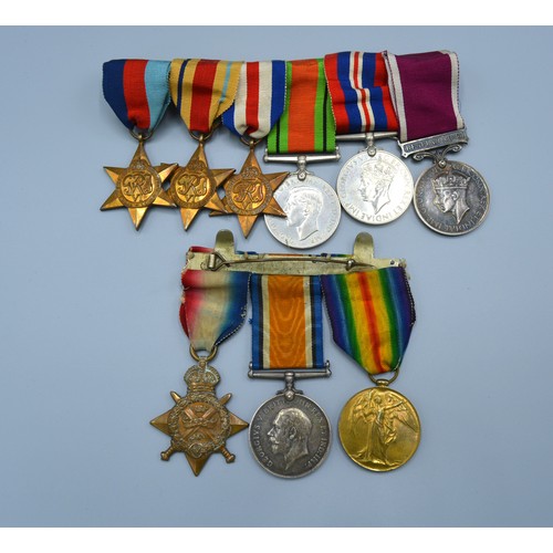 239 - A First World War and Second World War Father and Son Medal Group comprising a First World War group... 