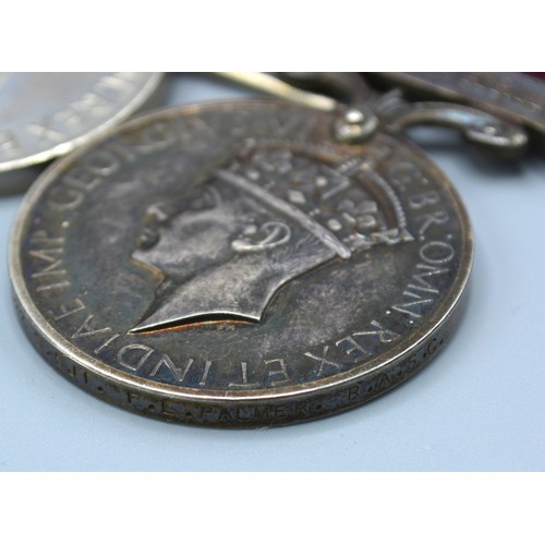 239 - A First World War and Second World War Father and Son Medal Group comprising a First World War group... 