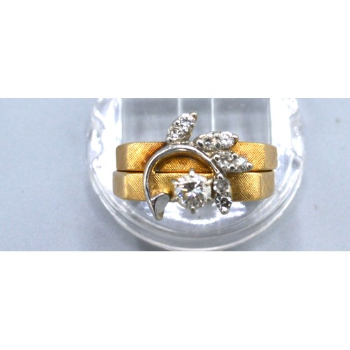 146 - A 14ct Gold Double Diamond Ring to include a solitaire, claw set and another set smaller diamonds in... 