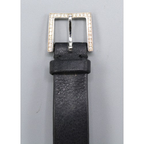 149 - Tiffany & Co. 18ct. White Gold Tonneau Diamond Set Ladies Wrist Watch, a black leather strap set wit... 