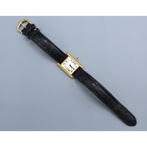 151 - A Cartier 18ct. Gold Tank 1150 Wrist Watch with leather strap and original buckle marked 750 and num... 