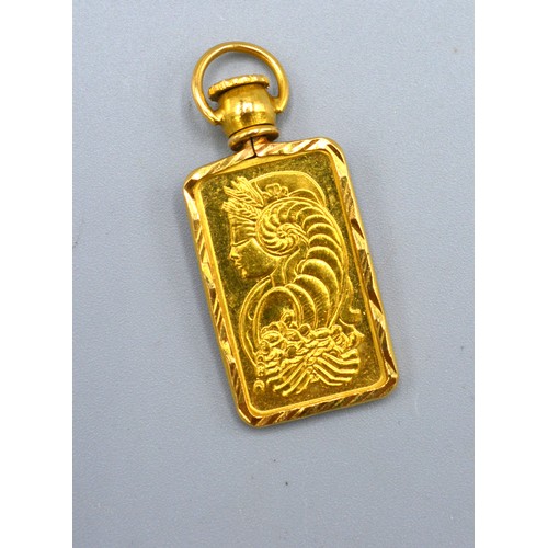 160 - A 24ct. Gold Pendant within gold mount, pendant 5 gms. and the mount 22ct. 2.7 gms.