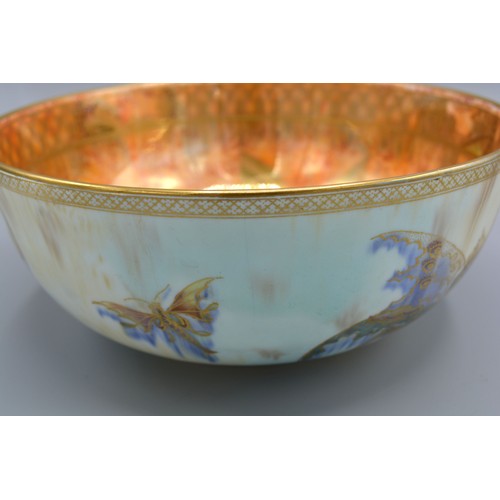 13 - A Wedgwood Lustre Bowl decorated with butterflies upon a mottled ground highlighted with gilt 23 cms... 