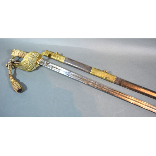 353 - A George VI Naval Officer's Sword with leather and brass scabbard