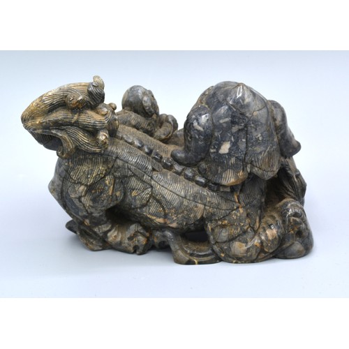 371 - A Chinese Carved Soapstone Model Of A Dog Of Fo 11 cms tall