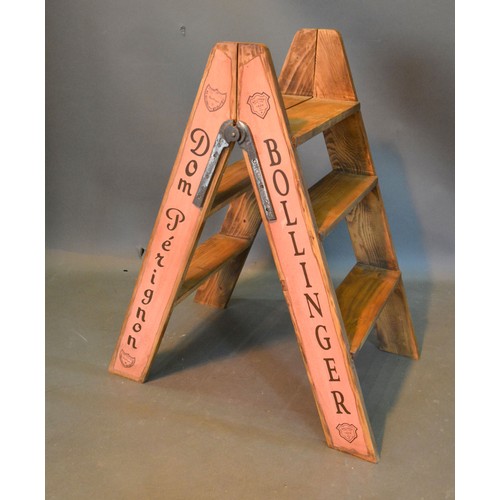 397 - A Pair Of Folding Bar Steps with inscriptions Moet & Chandon and Bollinger 81 cms tall