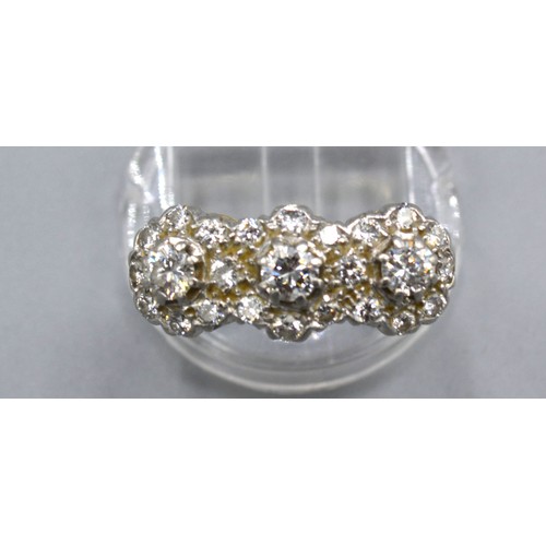 259 - An 18ct Yellow Gold Triple Diamond Cluster Ring within a pierced setting, ring size P, 7.5 gms., the... 