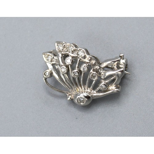 286 - A White Gold Diamond Set Brooch in the form of a butterfly, 15mm x 10mm, 2 gms.