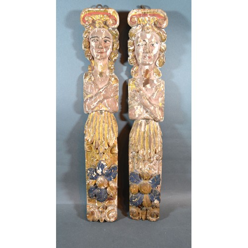 414 - A Pair Of Early Carved And Polychrome Decorated Wooden Columns 56 cms tall