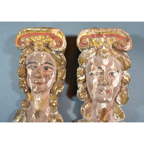 414 - A Pair Of Early Carved And Polychrome Decorated Wooden Columns 56 cms tall